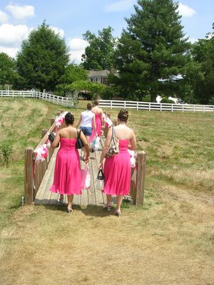 Walking across the bridge towards the mansion to get ready.